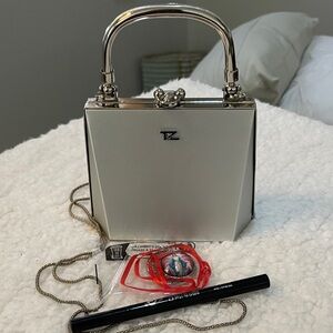 TZ Elegant Silver Handbag: it’s in the details and additional products.